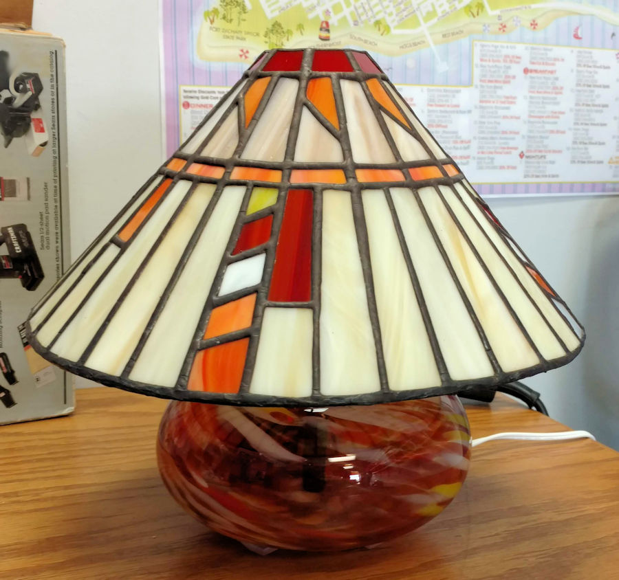 The wedding gift lamp, a totally unique pattern and the base started it's life as an oil lamp.   Used a diamond core bit to add wires for electric.